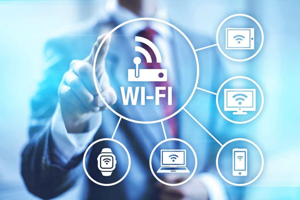 Wifi Image with various connectivity graphics and a businessperson